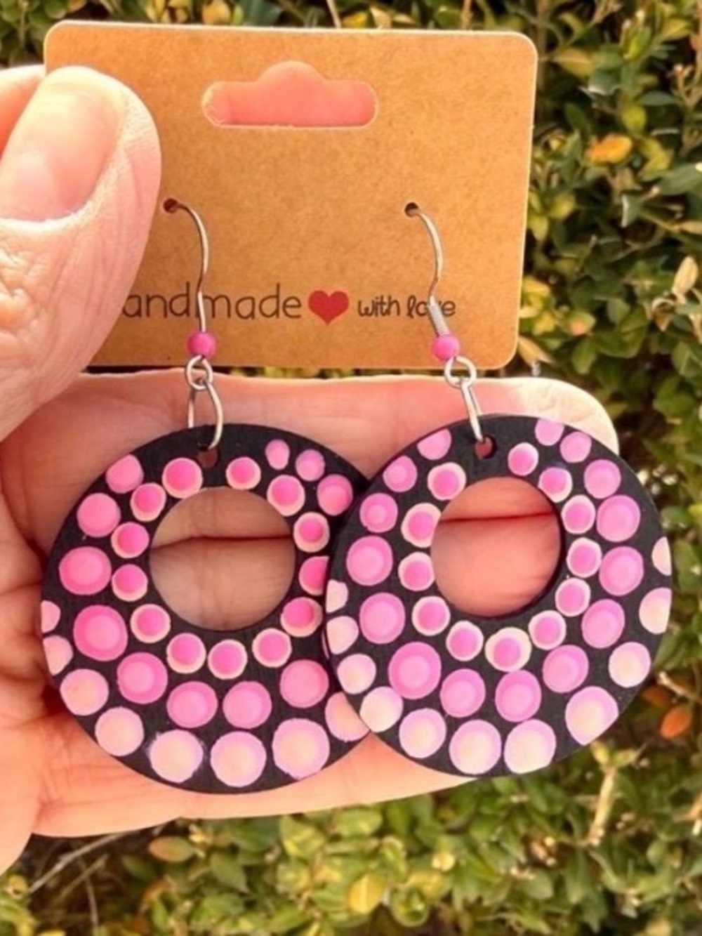 Hand Crafted Dot Painted open circle earrings wood 1.5” pink pastel in black